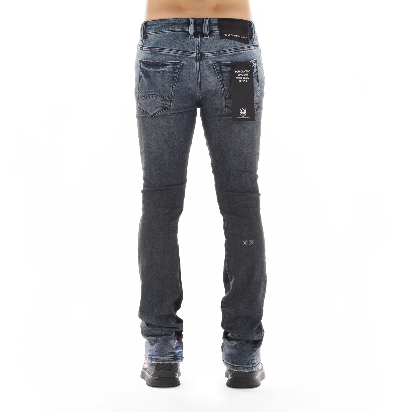 Back view of person wearing Lenny Bootcut in Billie jeans, featuring knee rips and crafted from premium denim composition of 92% Cotton, 4% Polyester, 2% Spandex